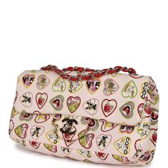 This Small Flap Bag is in Multicolor canvas with silver tone hardware and features a coco heart motif print, front flap with CC turnlock closure, and adjustable interwoven antique gold tone chain link shoulder/crossbody strap.The interior is lined in white fabric and has one zip pocket with a Chanel pull on the rear wall.Collection: 10-series (2005-2006)Origin: FranceCondition: Preowned; Excellent - This bag retains its structure. There is some minor wear on the exterior canvas including some ru Heart Motif, Vintage Valentines, Printed Bags, Valentine Heart, Vintage Chanel, White Fabric, Flap Bag, Crossbody Strap, Silver Hardware