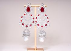 indian jewelry store online Red Chandelier Earrings For Formal Events, Formal Red Chandelier Earrings, Elegant Red Bridal Earrings, Elegant White Ruby Earrings, Red Drop Bridal Earrings For Formal Occasions, Classic Red Earrings For Party, Elegant Red Bridal Earrings For Party, Elegant Ruby Bridal Earrings For Wedding, Classic Red Party Earrings