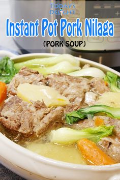 instant pot pork nizzaa soup in a bowl with carrots and celery