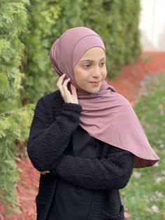 Our Modish Girl-Instant Hijabs are a must have! They are custom made for petite young girls. They are pre-sewn to easily slip on & wrap effortlessly. The Modish Girl Instant hijab-Rose Taupe was designed to be a head wrap that is ready in seconds. Simply pull over your head and adjust your hijab into place. It’s that simple!!! No pins required. Made from a high quality jersey fabric that feels cooling and breathable for ultimate comfort all day long. Our goal was to create the most versatile Casual Pink Hijab, Jersey Hijab, Instant Hijab, Beautiful Hijab, Head Wrap, Active Women, Gym Wear, Daughter Love, Head Wraps