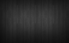 black wood wallpaper with vertical stripes in the center and dark background to the left