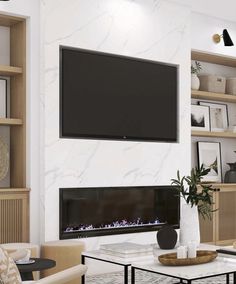 a large flat screen tv mounted on the wall above a fireplace in a living room