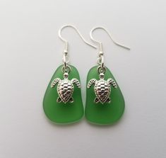 "Aloha! These design shows my love for this beautiful island of Hawaii. This item will be made to order and shipped directly from Hawaii. This is sea glass earrings with silver hooks. This handmade in Hawaii jewelry gift is from cultured sea glass that are specially formed into its shape for jewelry making. Each comes with a gift box with \"handmade by yinahawaii\" stamp and a ribbon wrapped as shown in the 2nd photo, ready to give as gift. I also offer Free gift messaging with the order. Please Green Jewelry With Matching Earrings For The Beach, Green Ocean-inspired Nickel-free Jewelry, Adjustable Nickel Free Sea Glass Earrings, Nickel-free Adjustable Sea Glass Earrings, Nickel Free Sea Glass For Jewelry Making, Nickel-free Sea Glass Jewelry For Jewelry Making, Green Dangle Jewelry For The Beach, Adjustable Nickel-free Sea Glass Earrings, Green Recycled Glass Jewelry For The Beach