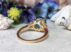 Don't miss this opportunity to own this beautiful gemstone ring crafted in 14k gold filled => Gemstone Type - Blue Topaz, Clear Quartz => Gemstone Cut - Faceted => Gemstone Size - 10 mm, 2 mm => Total Number of Gemstones - 7 => Metal Type - 14k Gold Filled (Tarnish Resistant And Nickel Free) - also available in 925 sterling silver * Please contact me for pricing on a sizes larger than 11 * ~ Feel free to ask me about custom made designs. ❏ Replacements and custom orders : ✪ 925 st Hallmarked Round Cut Topaz Ring Gift, Blue 14k Gold Hallmarked Birthstone Ring, Gold Blue Topaz Birthstone Ring, Round Cut, White Gold Blue Topaz Birthstone Ring, Round Cut, Blue Topaz Ring In 14k Gold, Round Cut, Engagement Rings Round, Ring Crafts, Round Rings, December Birthstone