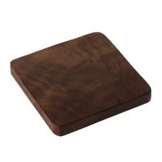 a square wooden object on a white background