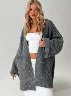 Oversized cable knit cardigan Drop shoulder, wide sleeves, folded back cuffs, twin hip pockets Good stretch, unlined 75% polyester 78% nylon 6% wool 1% spandex Cold machine wash Comfy Cardigan, Chunky Cable Knit Sweater, Oversized Sweater Cardigan, Cable Knit Sweater Cardigan, Crochet Clothing, Fleece Dress, Cardigan Outfits, Outerwear Outfit, Aesthetic Pics