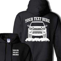 a black hoodie with an image of a car on it and the words, your text here