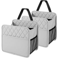 two white storage bags with black handles and straps on the sides, one is open to show