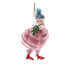 a pink glass ornament with a bird wearing a hat and scarf on it's head