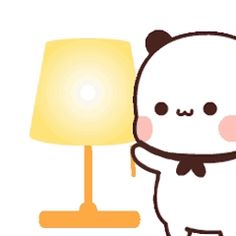 a cute little white bear standing next to a lamp