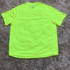 New With Tag Size:Xl Color: Fluorescent Yellow/Silver Casual Yellow Moisture-wicking T-shirt, Yellow Moisture-wicking Short Sleeve Tops, Yellow Sporty Shirt For Sports, Sporty Yellow Shirt For Sports, Yellow Moisture-wicking Short Sleeve T-shirt, Yellow Short Sleeve Sports Top, Yellow Nike T-shirt With Short Sleeves, Nike Green Short Sleeve T-shirt, Nike Yellow Short Sleeve T-shirt