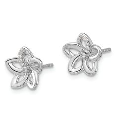 Rhodium over 14k white gold diamond flower stud earrings. Measure approximately 7/16"L x 3/8"W and have push backings. Fine Jewelry Diamond Earrings With Flower Shape, Flower-shaped Cubic Zirconia Diamond Earrings With Accents, Diamond White Earrings With Diamond Accents In Flower Shape, Silver Flower Diamond Earrings For Formal Occasions, Formal White Gold Flower Earrings With Diamond Accents, Sterling Silver Brilliant Cut Flower Earrings, Sterling Silver Flower-shaped Earrings With Brilliant Cut, White Gold Flower Diamond Earrings With Prong Setting, Silver Flower-shaped Earrings With Diamond Accents