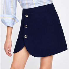 Product Information A-Line Skirt With A Horizontal Texture. Features Metal Buttons In The Front And Back Zip Fastening Hidden In The Seam. Height Of Model: 178 Cm. / 5′ 10″ Navy Skort For Workwear, Blue Mini Skirt For Workwear In Fall, Blue Mini Skirt For Fall Workwear, Blue Skirt With Button Closure For Fall, Chic Blue Mini Skirt With Button Closure, Blue Buttoned Mini Skirt, Zara Blue Lined Mini Skirt, Blue Short Mini Skirt For Fall, Blue Mini Skirt With Buttons