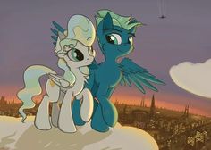 two ponies standing on top of a hill in front of a cityscape