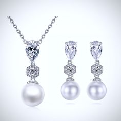 Romantic and elegant, this glowing pearl necklace and earrings set can complete the most sophisticated of bridal looks. A solitaire glass pearl (10mm) and cubic zirconia adorn the pendant that is hanging from a delicate chain for a very glamorous look. Overall length of the necklace is 18" (approx. 46cm). Closure is a lobster claw clasp with a 2" extension chain for comfortable sizing. The earrings are a replica of the pendant (10mm pearls) and come with sturdy backs. Overall length of the earri Formal Pearl Drop Jewelry Sets With Cubic Zirconia, Elegant Pearl Drop Jewelry Set With Cubic Zirconia, Elegant Crystal Jewelry Sets With Pearl Drop, White Pearl Drop Bridal Necklace With Cubic Zirconia, White Cubic Zirconia Bridal Necklace With Pearl Drop, Formal White Jewelry Sets With Pearl Pendant, Formal White Pearl Pendant Jewelry Set, Pearl Necklace And Earrings, Pearl Necklace Wedding