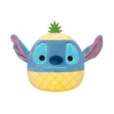 a stuffed toy with a pineapple on top of it's head and eyes