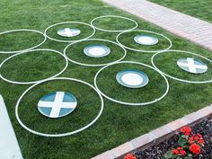 a lawn with circles and crosses painted on it