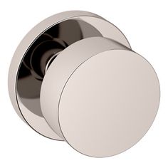 an image of a round knob on a doorknobl in chrome or white