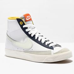 Nike Kids Blazer Mid '77 White & Navy Uv Reactive Shoes Size 7y Excellent Quality Brand New In Box Look At The Pictures For More Details Feel Free To Make Me A Offer Or Ask Me A Question I Always Accept Offers Free Smoke Home With A Playful Uv Reactive Design, The Kids Nike Blazer Mid '77 Returns In A White Leather Construction With Navy Blue Detailing. The Swoosh Accents Along The Sidewalls Turn Blue When Exposed To The Sun; Making Your Time Outside Even More Special. With Orange And Yellow Ton Retro White High-top Sneakers With Round Toe, Retro White High-top Sneakers With Rubber Sole, White High-top Retro Sneakers, White Mid-top Skate Shoes With Rubber Waffle Outsoles, Retro Nike High-top Sneakers For Spring, Spring Nike High-top Sneakers With Vulcanized Sole, Nike High-top Sneakers With Vulcanized Sole For Spring, Kids Blazers, Nike Air Max 200