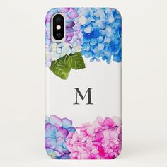 blue, pink and purple hydrangeas with the letter m on it's back