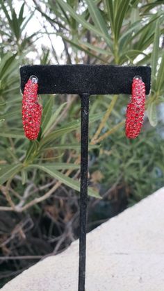 These fun and stylish rhinestone red hoop earrings are a great accent piece! Pageant, prom, or bridal! Size of earrings: 1 inch long colors available: Red Rhinestones Base Metal Color: silver looking for a bracelet to complete your look? check out this matching bracelet! :) https://www.etsy.com/listing/555905478/red-rhinestone-bracelet-red-stretch?ref=shop_home_active_10 https://www.etsy.com/listing/593911028/red-bracelet-red-crystal-bracelet-red?ref=shop_home_active_58 Looking for the perfect p Red Hoop Earrings, Red Bracelet, Fun Ornaments, Red Prom, Red Bracelets, Crystal Stars, Matching Bracelet, Red Rhinestone, Rhinestone Bracelet