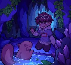 a boy in goggles standing next to a bear and another animal on the ground