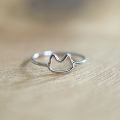 This ring features a cute cat face outline connected by a slender sterling silver band. Great for stacking or everyday wear. ✩ Sterling silver cat face is 8mm wide; sterling silver band is 1.5mm. Choose from a US size 5, 6, 7 or 8. All components are sterling silver. ✩ Comes beautifully packaged as shown in a branded box with care instructions. If this is intended as a gift, please let us know when you check out...that way we can include a blank gifting card for you! ~ Please be sure to read my Cat Rings Jewelry, Silver Cat Ring, Face Outline, Owl Cat, Cute Cat Face, Gold Vermeil Jewelry, Sterling Silver Cat, Cat Ring, Silver Cat