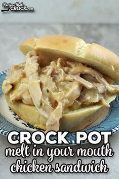 a chicken sandwich on a plate with the words crock pot met in your mouth chicken sandwich