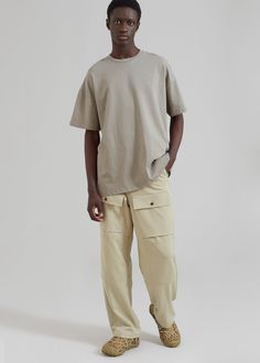 Color: Slate Green Lightweight woven fabric Relaxed fit Front flap pocket detailing Darted and paneled leg detailing Slant hip pockets Back flap patch pockets with button closure Front button closure Zip fly Unlined 78% Polyester 17% Rayon 5% Spandex Dry Clean By The Frankie Shop. Imported Relaxed Fit Cargo Pants With Welt Pockets For Streetwear, Relaxed Fit Overalls With Pockets, Utility Khaki Bottoms With Welt Pockets, Relaxed Fit Khaki Cargo Pants With Welt Pockets, Urban Khaki Bottoms With Patch Pockets, Relaxed Fit Cargo Pants With Straight Hem, Casual Cargo Pants With Side Pockets And Straight Hem, Cargo Pants With Pockets And Relaxed Fit, Relaxed Fit Khaki Cargo Pants With Patch Pockets