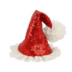 a red sequin hat with white ruffles and a flower on the side