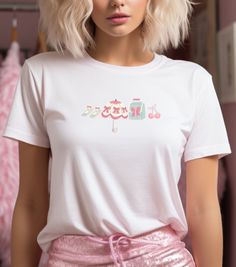 Step into the world of whimsy with our Coquette Charm Women's Tee! This delightful shirt features a collection of cute coquette designs - bows, cherries, vintage purse, umbrella, and shoes, all in a playful arrangement. Available in white, Solid Natural, and Light Pink, this tee is perfect for those who adore the coquette aesthetic. Embrace the charm and elegance of this custom-designed shirt, crafted for comfort and style. Make a statement with our Coquette Charm Women's Tee and let your fashion speak volumes.  #CoquetteStyle #WhimsicalFashion #CharmingTee Cute Coquette Tee, Coquette Y2K Top, The Boyfriend Tee for Women, Cute Y2K Shirt, Trending Shirts, Y2K 90s 2000s clothing, Coquette Clothing This feminine cut classic tee provides a fashionably casual look. A signature style from Next L Shirts Y2k, Clothing Coquette, 2000s Clothing, Coquette Clothing, Shirt Coquette, Cute Coquette, Coquette Y2k, The Boyfriend, Y2k Top