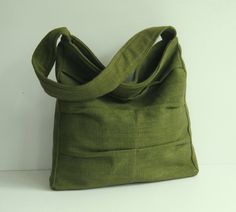 Another great bag. Green Hobo Bag With Pockets For Daily Use, Eco-friendly Green Hobo Bag For Travel, Green Canvas Bag With Removable Pouch For Everyday, Green Shoulder Bag As Gift, Green Shoulder Bag Gift, Green Shoulder Bag As A Gift, Eco-friendly Hobo Bag With Adjustable Strap, Green Square Canvas Bag For Everyday Use, Eco-friendly Green Bags For Gifts