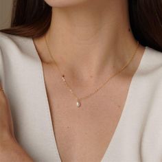 Add a touch of elegance to your collection with our stunning 14K Gold Filled Pearl Necklace. Featuring a delicate freshwater pearl drop, this natural pearl necklace exudes timeless beauty and sophistication. Perfect for brides or anyone looking to add a dainty yet luxurious piece to their jewelry collection, this pendant necklace is both versatile and exquisite. ✨ Details: Metal: 14K Gold Filled Item Weight: Approx. 0.5g Pearl Size: Approx. 5mm Pearl Type: Natural Freshwater Pearls Gold filled j Pearl Teardrop Drop Necklace As Gift, Pearl Charm Necklace, Gift For Her, Pear-shaped Drop Necklace With Pearl Chain For Gift, Briolette Pearl Necklace With Pearl Charm As A Gift, Briolette Pearl Charm Necklace For Gifts, Briolette Pearl Charm Necklace, Pearl Briolette Necklace For Gift, Briolette Pearl Necklace Gift, Delicate Pearl Charm Necklace For Anniversary