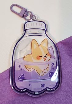 a glass bottle with a cartoon dog in it