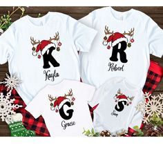 Personalized matching Christmas Family Shirts - Perfect for holiday pictures or even pj tops for Christmas Night.   This listing is for the tshirts only Available in Newborn - Toddler - Kids - Adult  Your Tshirts comes customized with the first letter of each family members name and their name written accross bottom of shirt These shirts are not vinyl, they are direct to garmet printing which prints directly into the fabric FREE SHIPPING any order over $35.00 automatically  Any questions, please Pre-shrunk White Christmas Shirt, Family Matching White Tops For Christmas, Family Matching White Christmas Tops, White Family Matching Christmas T-shirt, Family Matching Holiday Shirt With Letter Print, White Family Matching Holiday Tops, Family Matching White Holiday Tops, Family Matching White Tops For Holiday, White Family Matching Tops For Holidays