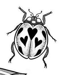 a ladybug sitting on top of a leaf next to a book with hearts drawn on it