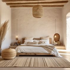 a large bed sitting in a bedroom on top of a wooden floor