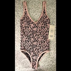 Nwt Women’s Aura Leopard Print Bodysuit W Snap Closure Adorable With Jeans, Skirts, Or Under A Blazer Medium Depth V Neck Snap Closure Size S/M- This Is Definitely On The Small Size (I Am 5’3 Or 5’2” And Weigh 98lbs And It Is Fitted!) Pink Fitted V-neck Bodysuit, Pink Stretch Bodysuit With Lined Body, Pink Seamless V-neck Swimwear, Pink Summer Beachwear Bodysuit, Pink Seamless Bodysuit For Swimming, Sleeveless Seamless Pink Swimwear, Seamless Pink Bodysuit For Swimming, Pink Sleeveless Bodysuit For Loungewear, Sleeveless Pink Lined Bodysuit