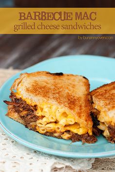 two grilled cheese sandwiches on a blue plate with the title barbecue mac grilled cheese sandwiches