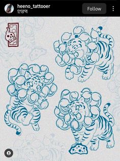 an image of two blue and white tiger tattoos on a cell phone with chinese characters