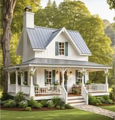 a white house with blue shutters and a porch