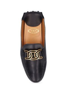 10mm Heel. Leather upper. Stitching details . Gold-colored metal logo detail. Leather lining and insole. Rubber sole Ski Accessories, Stitching Details, Loafer Mules, Mule Sandals, Sports Accessories, Leather Mules, Flat Espadrilles, Metal Logo, Swim Accessories