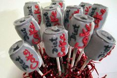 many toothpicks with red and black designs on them