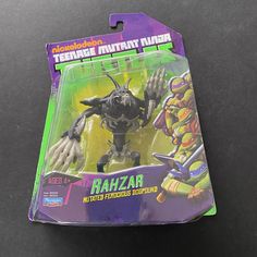 an action figure in the packaging for teenage mutant ninja