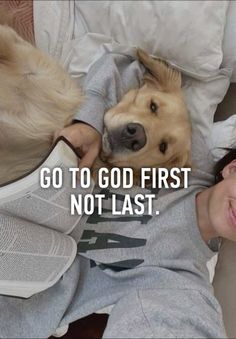 a woman laying in bed next to two dogs with the caption go to god first not last