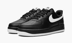 The Nike Air Force 1 Low “Black/White” is a two-tone, white-and-black colorway of the retro basketball and lifestyle shoe designed for versatility.  The “Black/White” combines two classic Air Force 1 colorways, the “Triple Black” and “White on White,” into one.  The entire upper, save for the white leather Swoosh and leather heel tab, appear in black leather, including the perforated toe, mid-panel, collar, and overlays.  Black “Nike Air” and Swoosh branding are embroidered on the heel.  “Nike A Air Force 1 Colorways, Black White Shoes, Retro Basketball, Black And White Shoes, Nike Air Force 1 07, Nike Air Force 1 Low, Air Force 1 Low, Triple Black, Nike Cortez Sneaker