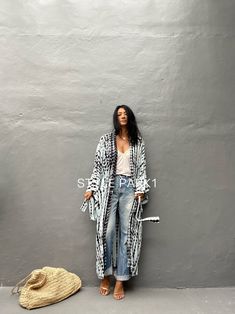 Bali Tie dyed Kimono long jacket, It's made by the Bali's traditional hand Tie dyed Perfect for a swimsuit cover up on the beach or by the pool , with shorts and a tank top or over a summer dress. At home wear If you are very small this may be too big. 👗Stylepark1 Model Sue -Her height is 175Cm/5.74ft weight is 64kg/141.09Ib /American size, she wore ~ M to large size. Made from soft Rayon 🙏🏻 At first, you may smell of the unique dye. It will disappear after you wash it. So do not worry. 👗col Long Cotton Beach Outerwear, Long Sleeve Kimono With Natural Dye For The Beach, Long Tie Dye Kimono For Vacation, Long Tie-dye Kimono For Vacation, Long Hippie Outerwear For Beach, Long Hippie Style Beach Outerwear, Hippie Long Outerwear For Beach, Long Hippie Beach Outerwear, Hippie Long Beach Outerwear