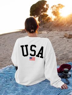 "Usa Sweatshirt, Patriotic Usa Sweatshirt, Usa Flag Sweatshirt, Memorial Day Sweatshirt, Usa Flag Sweatshirt, 4th of July America Shirt Hi! Welcome to✨Northstar Sweatshirt &Hoodies✨ ✨As the weather gets colder, you want clothes that keep you and your body warm. Here, Northstar Sweatshirt &Hoodies is ready to keep you warm with its unique designs. These soft and cotton sweatshirts and hoodies can be combined with anything.✨ ✨Product Features✨ 👉Medium-heavy fabric (8.0 oz/yd² (271.25 g/m 👉Loose White Crew Neck Sweatshirt For 4th Of July, Independence Day Cotton Sweatshirt With Letter Print, Independence Day Cotton Letter Print Sweatshirt, White Long Sleeve Tops For Independence Day, Patriotic Long Sleeve Sweatshirt For Independence Day, 4th Of July Cotton Crew Neck Sweatshirt, Patriotic White Cotton Sweatshirt, Long Sleeve Relaxed Fit T-shirt For 4th Of July, White Long Sleeve T-shirt For 4th Of July