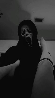 a person wearing a mask with their mouth open