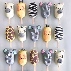 there are many animal lollipops on the stick